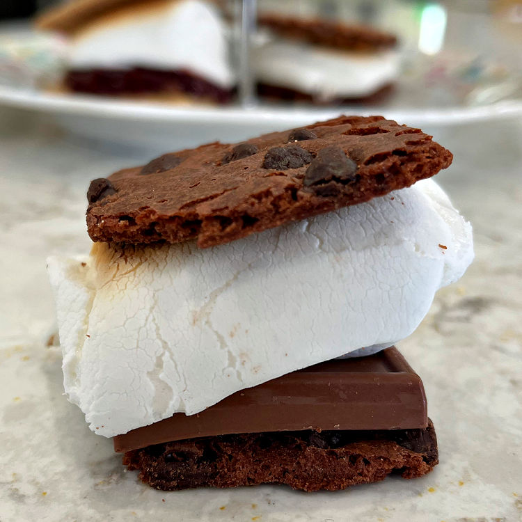 Image of Brownie Brittle, Ghirardelli Caramel Squares and marshmallow Smores for a post about how to make smores at home.