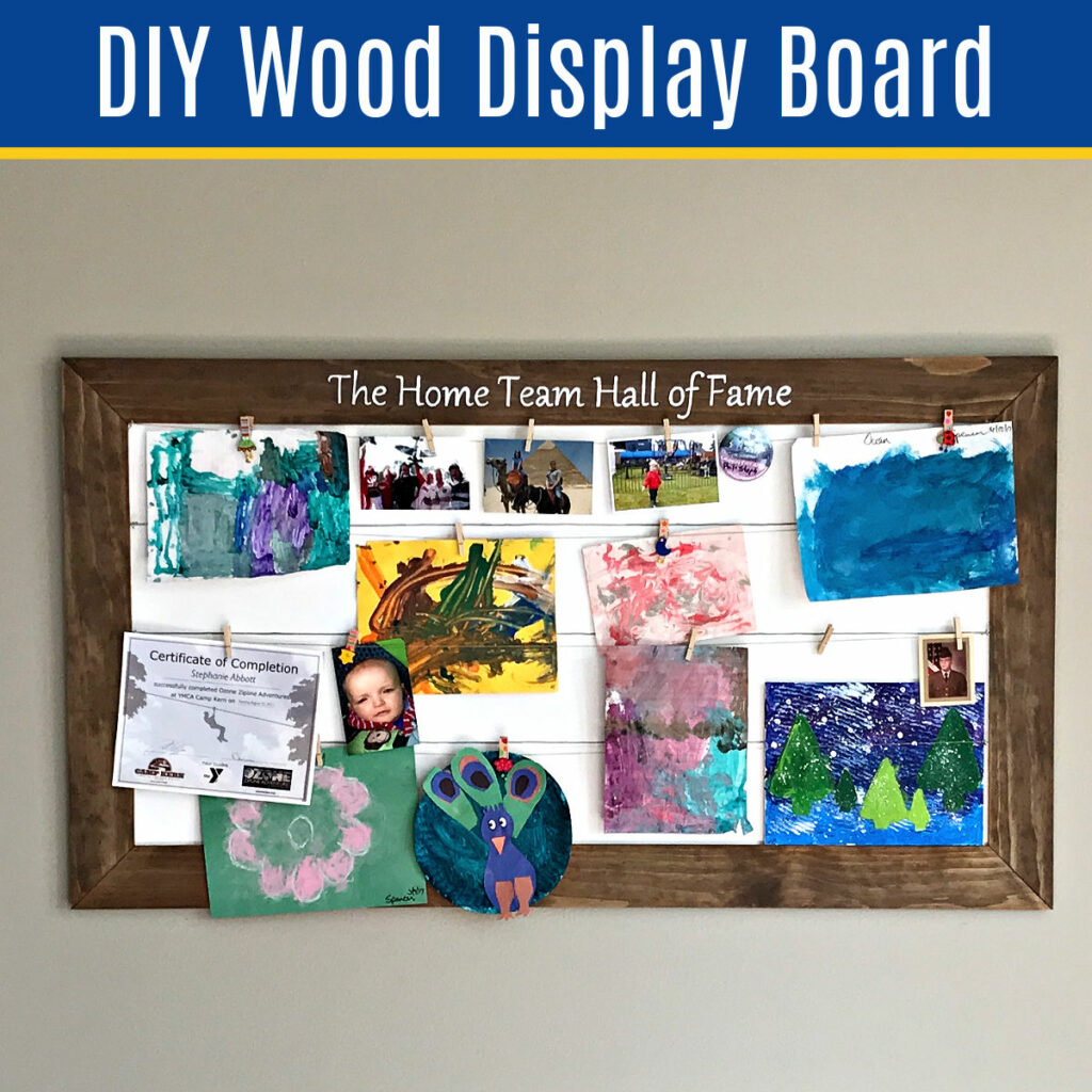 This easy DIY Wood Display Board or Noticeboard is a pretty way to get organized or show off your family photos, awards, and memories!