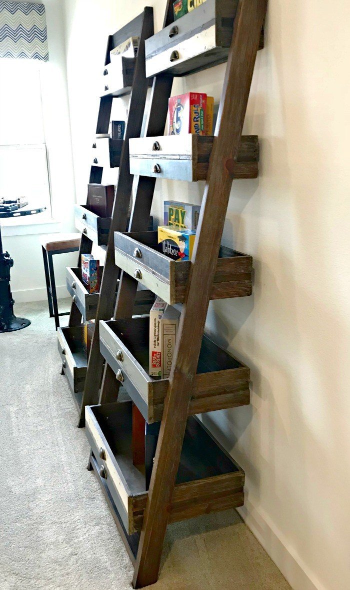 Upcycled Drawer Leaning Bookshelf Idea. Check out this photo tour from Model Homes with Beautiful Furniture and Home Interior Design Ideas that I love!