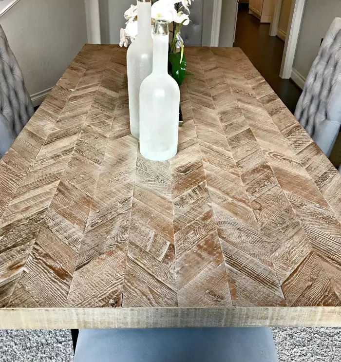 Whitewashed Herringbone Dining Table Design. Check out this photo tour from Model Homes with Beautiful Furniture and Home Interior Design Ideas that I love!