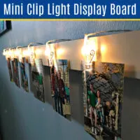 Make this Easy DIY Mini Clip Light Display Board. I love this easy home decor idea for bedrooms, dorm rooms, living rooms, and an office! Easy DIY Home Decor Idea using mini LED string lights.
