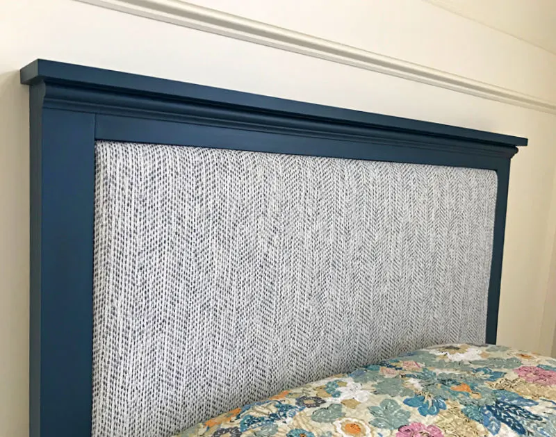 A DIY Twin Upholstered Headboard with a wood frame and upholstered center. DIY Twin Headboard.