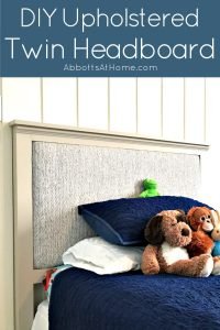 Easy steps and how-to build and upholster videos for this DIY Upholstered Twin Headboard. Build the simple frame out of wood. Then upholster the back of the headboard with your favorite fabric.