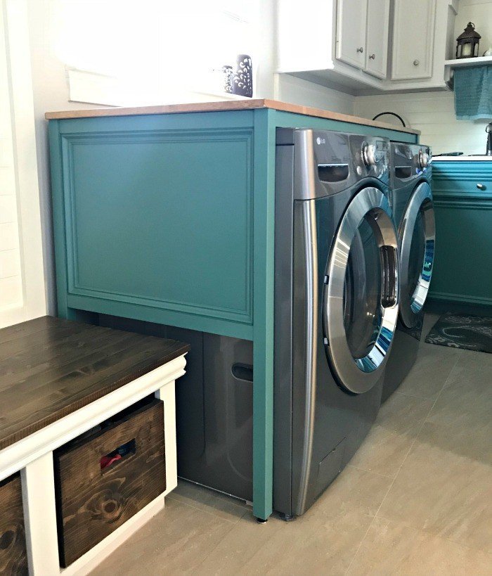 Free Plans for this DIY Laundry Table Over Washer and Dryer. This simple build hides those ugly machines, adds extra style and organization. And works as a Laundry Folding table too! #LaundryTable #LaundryFoldingTable #DIYFurniture #LaundryRoomIdeas #AbbottsAtHome