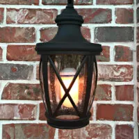 Image of a Black Front Porch light with a light bulb that flickers like gas light flame lights.