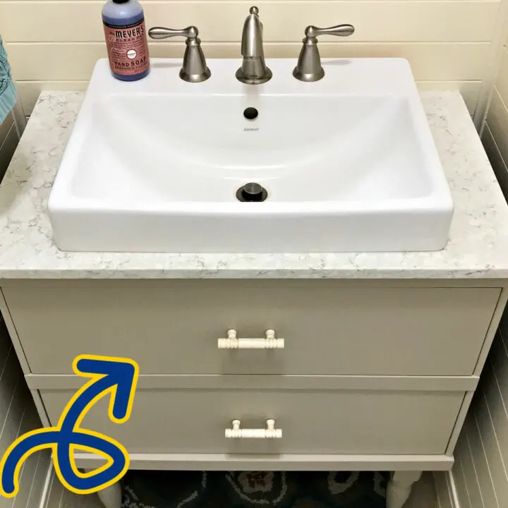 Image of a bathroom vanity with drawers cut for plumbing.