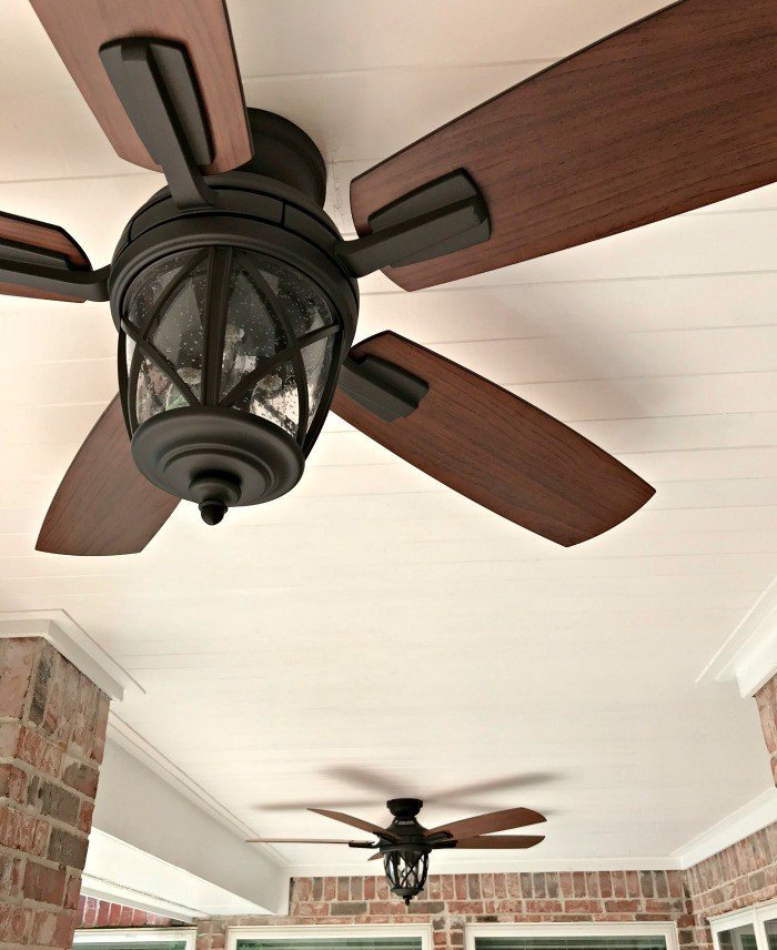 Modern Farmhouse DIY Pine Tongue and Groove Ceiling Tutorial that will turn your porch into that beautiful, charming spot you've always wanted. For most porches, you can have these wood planks installed in a weekend, guys! #AbbottsAtHome #PlankCeiling #PorchCeiling #TongueAndGroove