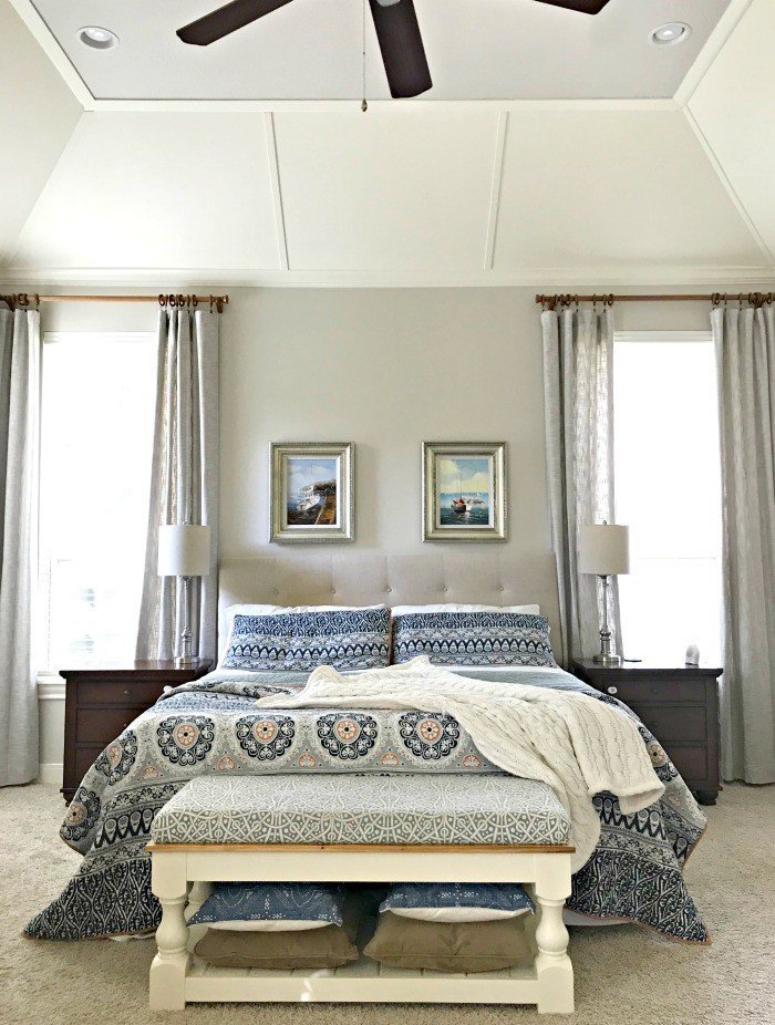 Turn that vaulted ceiling into the feature it should be! This DIY Wood Panel Vaulted Ceiling Makeover gave our Master Bedroom instant style.