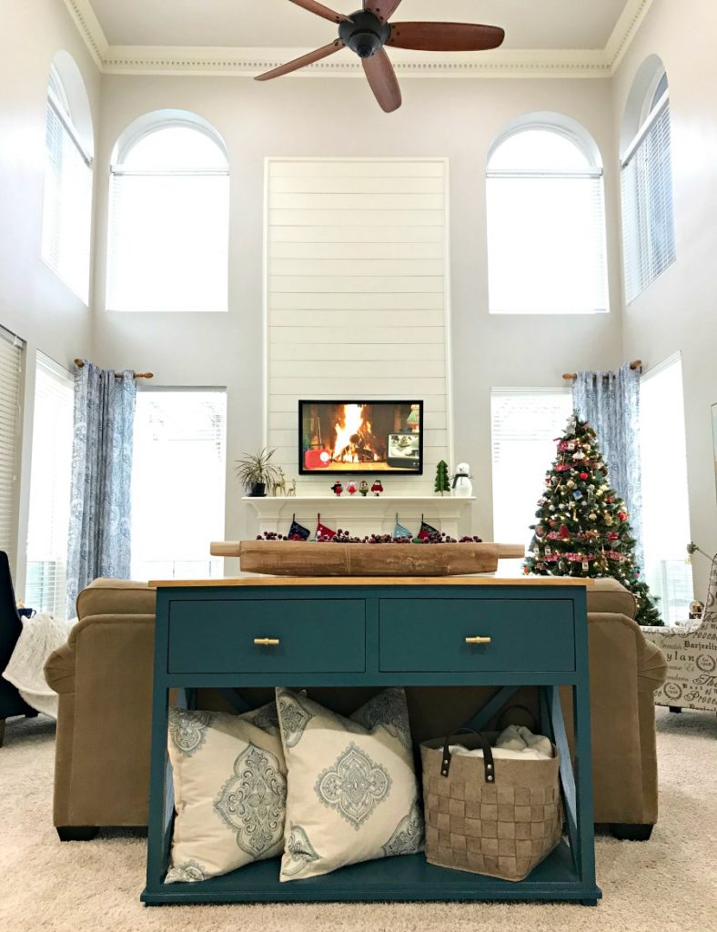 Tour our cozy Modern Farmhouse, Traditional Living Room with this look at our fun & colorful Living Room Christmas Decorations, this year. Full of pops of Red, Blue, and Green! #AbbottsAtHome #ChristmasIdeas #ChristmasDecorations #ChristmasDecor #ChristmasLivingRoom