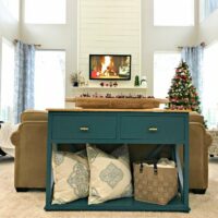 Tour our cozy Modern Farmhouse, Traditional Living Room with this look at our fun & colorful Living Room Christmas Decorations, this year. Full of pops of Red, Blue, and Green! #AbbottsAtHome #ChristmasIdeas #ChristmasDecorations #ChristmasDecor #ChristmasLivingRoom