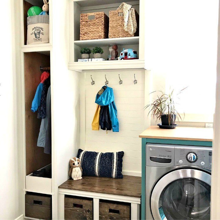 Love this DIY! Here are the cheap and doable DIY projects I used when I Added a Mudroom to our Laundry Room. #LaundryRoom #Mudroom #HomeRemodel #MudroomBench #AbbottsAtHome
