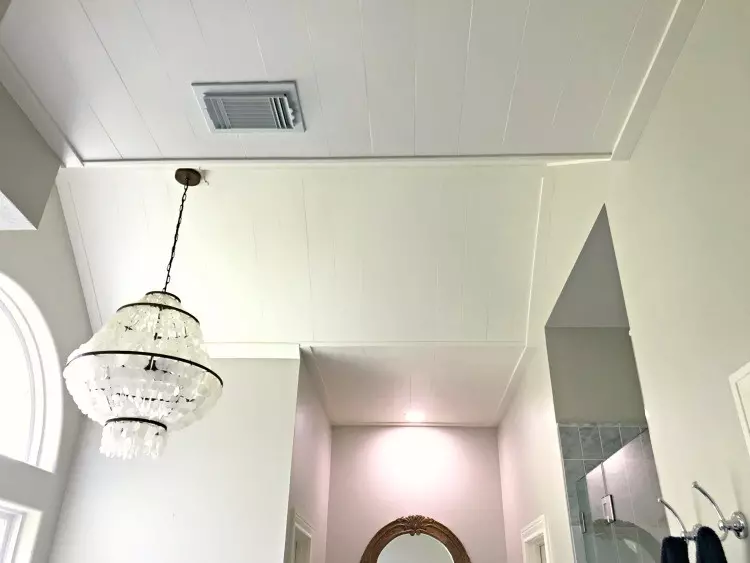 This DIY Plywood Plank Ceiling Installation is a pretty cross between faux shiplap and v-groove boards. And, it's such an easy DIY project, she did it alone. #AbbottsAtHome #Ceiling #CeilingIdeas #CeilingMakeover #DIYPlywoodPlanks #FauxShiplap #Shiplap