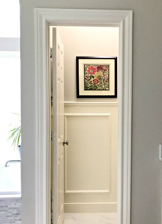 Picture Frame Wainscoting is a beautiful and timeless look. AND, it's actually really easy to install. Here are my DIY tips and tutorial video! #Wainscot #Wainscoting #AbbottsAtHome #Moulding #ChairRail #PictureFrame