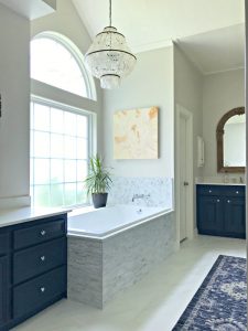 Yay! Our Bathroom Remodel is finished and I finally get to share all of the Before and After Master Bathroom Remodel photos with you guys. I've got all of the DIY projects and design details behind this DIY Bathroom Remodel with a walk in shower and drop in tub. #AbbottsAtHome #BathroomDecor #MasterBathroom #MasterBathroomIdeas #TileIdeas #DropInTub #SoakingTub