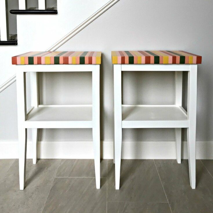 How to build a colorful table top using 2x4 pine studs and acrylic paints. Great woodworking tutorial using cheap pine framing studs! #woodworkingprojects #woodprojects #woodart #diyfurniture #AbbottsAtHome