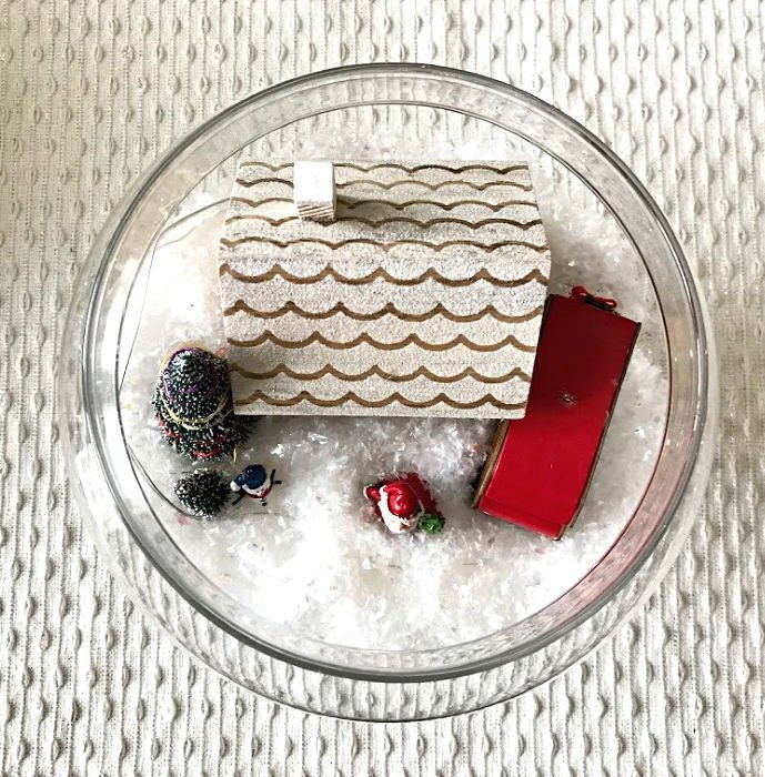 Looking for Easy Christmas Craft Inspo? Here's how I use Christmas ornaments, glass containers, and wooden bowls to design little Modern Farmhouse Christmas Villages my family loves. With how-to video and lots of photo inspiration. #AbbottsAtHome #Christmas #RedTruck #ChristmasDecor #ChristmasDecorations #ChristmasCraft