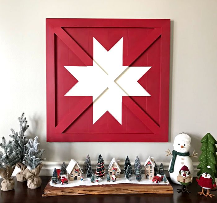 How to build this Wooden DIY Barn Star Art (Wood Barn Quilt) for less than $20 in lumber. Pottery Barn sells it for $400. Winning! DIY Wood Sign - Barn Quilt - Pottery Barn Knock Off #ChristmasProjects #ChristmasDecor #ChristmasSign #PotteryBarn #BarnQuilt #AbbottsAtHome