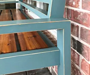 Easy to follow steps for this beautiful DIY Blue Distressed Paint using petroleum jelly (Vaseline) and Magnolia Homes by Kilz paint color Demo Day. Paint an Outdoor Bench or any furniture with these steps.