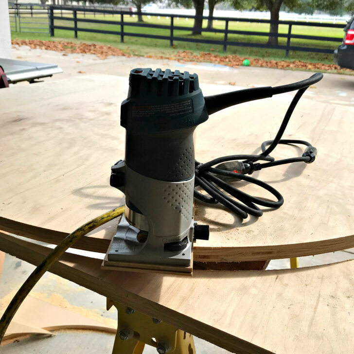 Image of a round table top made from plywood circles for a tutorial with DIY steps.