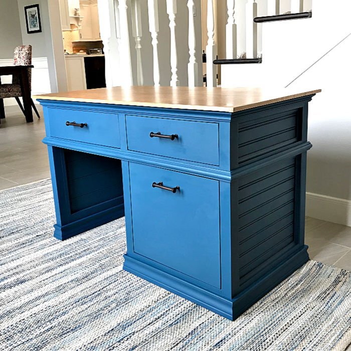 Grab the printable Woodworking Build Plans for this beautiful DIY Kids Desk With Storage Drawers. Includes full build steps and build overview video to help you build your own. DIY furniture plan for a kids executive style desk.