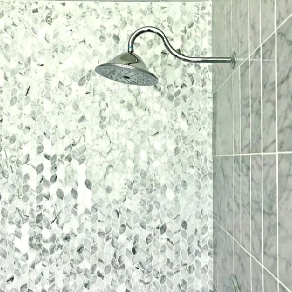 Here's the easy to follow DIY steps for How to Clean Marble Shower Tile, safely kill that gross mildew, and seal your marble. With How-To Video and DIY Marble Tile Cleaning Steps.
