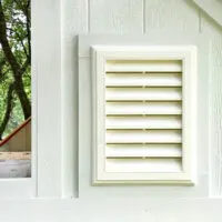 Image of a Vinyl Gable Vent Install in a Shed Wall. For a post with gable vent installation steps and video.
