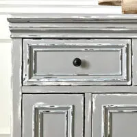 Image of a Gray and White Layered and Distressed Chalk Paint Look on Furniture with how-to steps and video.