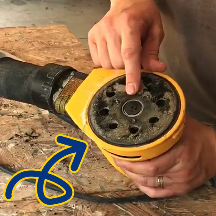 Image of a Velcro Orbital Sander Pad before replacement.