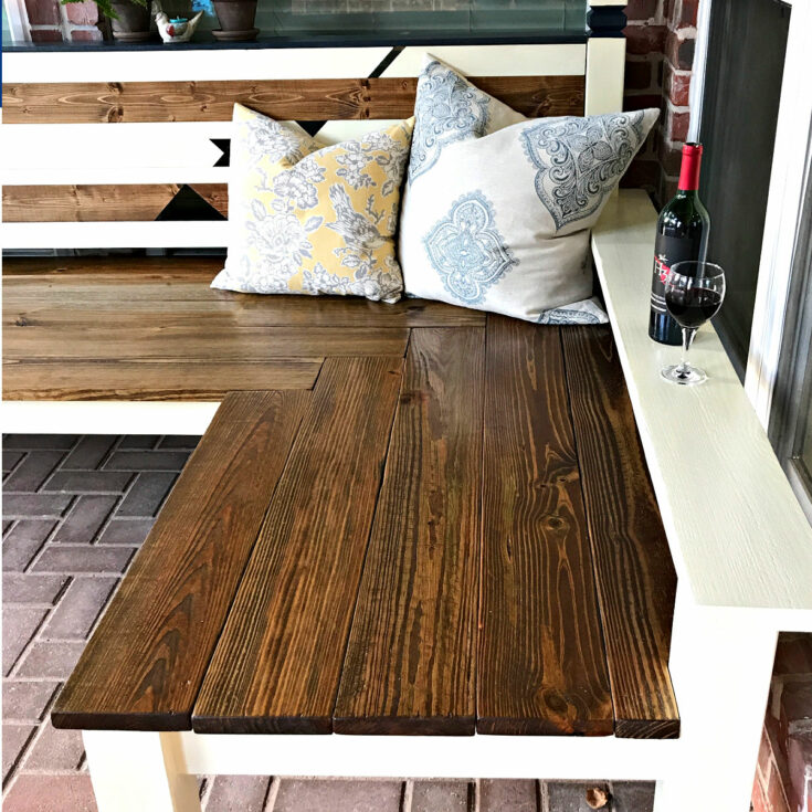 Image of a wooden outdoor DIY corner bench with steps to build for woodworkers.