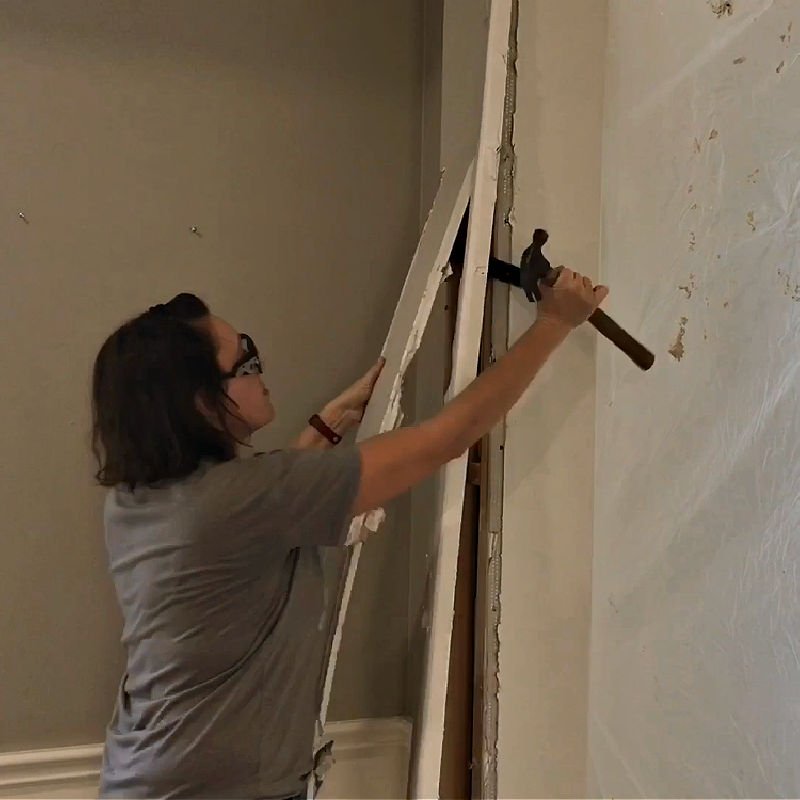 Here's how to remove an arched doorway in a wall with tips for demo, framing, and how to square off rounded arches.