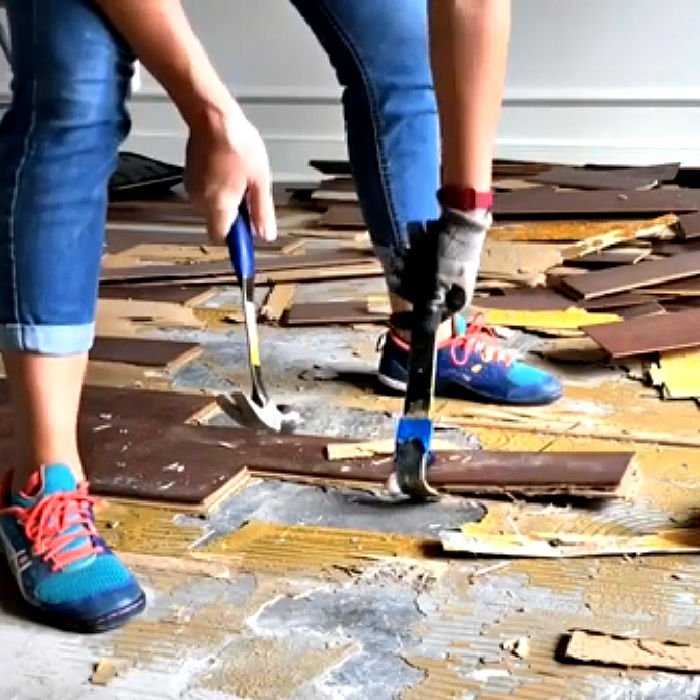 DIY tips and video showing How to Remove Glued Wood Flooring or Engineered Wood Flooring and Flooring Adhesive on Concrete.