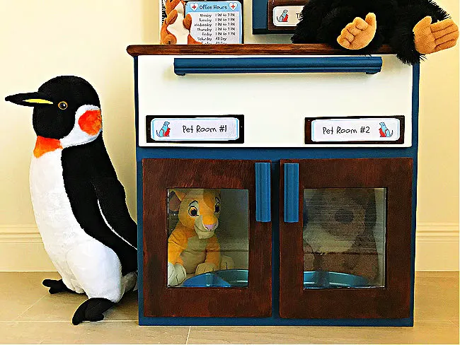 Make your kids this sweet little DIY Play Animal Doctor Office with this easy to follow beginner woodworking build plan. This DIY Kids Play Pet Hospital has been a popular playset with our little veterinarians, this year. Printable Pet Clinic Signs, Patient Forms, and Build Plans Available.