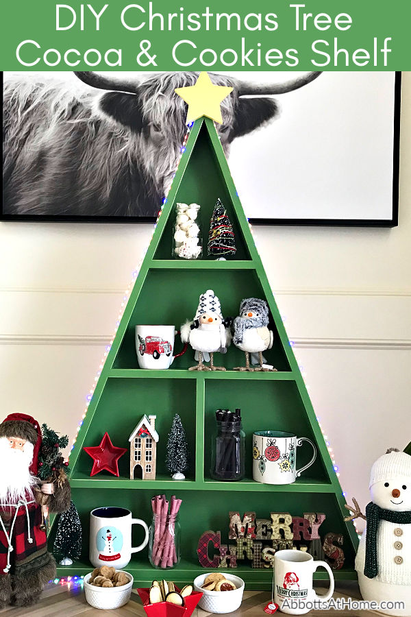 I'm loving this easy woodworking project! This DIY Wood Christmas Tree Shelf is a great display for Cocoa Bars, Christmas Villages, or Ornaments. Printable woodworking plans, easy enough for beginner woodworkers. 