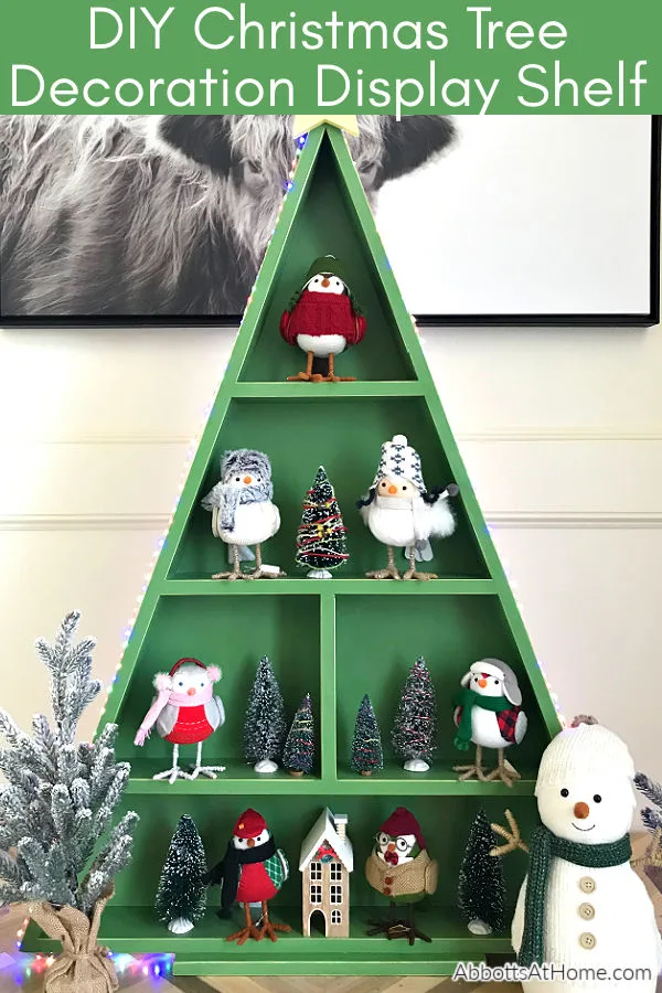 I'm loving this easy woodworking project! This DIY Wood Christmas Tree Shelf is a great display for Cocoa Bars, Christmas Villages, or Ornaments. Printable woodworking plans, easy enough for beginner woodworkers. 