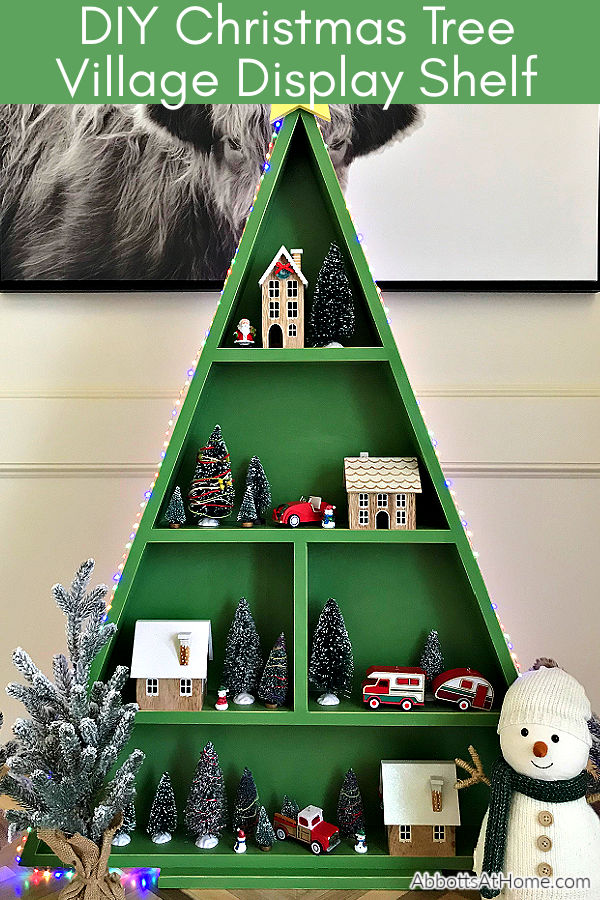 I'm loving this easy woodworking project! This DIY Wood Christmas Tree Shelf is a great display for Cocoa Bars, Christmas Villages, or Ornaments. Printable woodworking plans, easy enough for beginner woodworkers. 