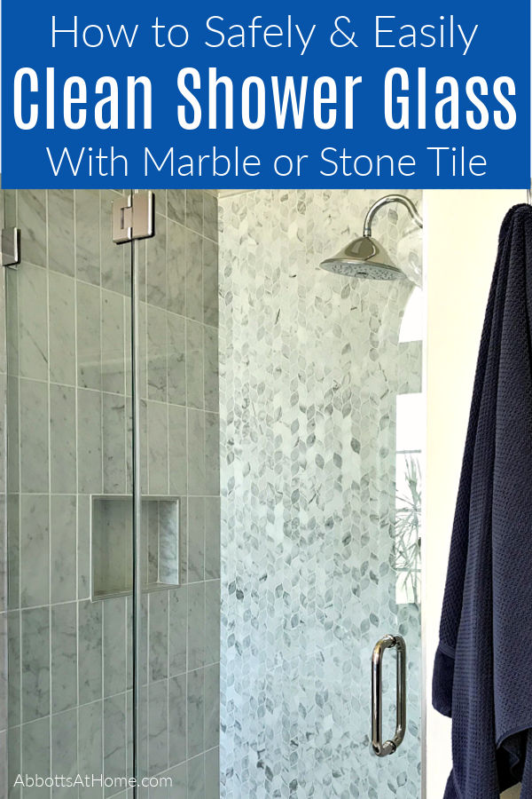 You can quickly and safely clean a shower glass door with marble or stone tile using vinegar & backing soda. But, be careful doing it! Vinegar can etch, stain, and pit your marble and stone tile. Here's a step by step guide to how to clean your glass shower door without damaging your tile.