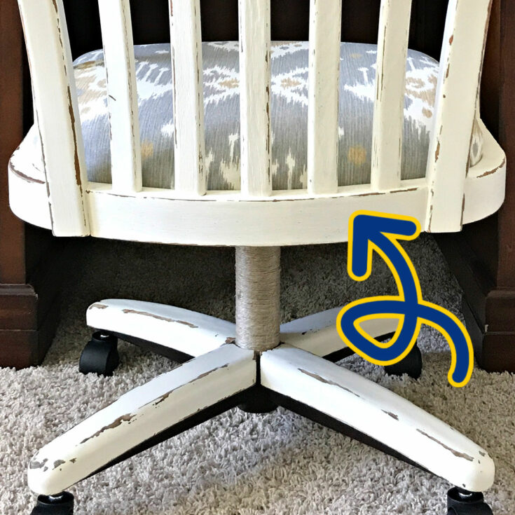 Image of a distressed white chair with an easy DIY shabby chic chalk paint furniture look.