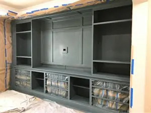 Easy to follow step by step guide for how to paint built in bookshelves and cabinets. With photos, printable steps and video tutorial. How to Paint Cabinets. How to Paint Bookshelves.