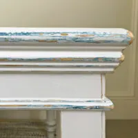I LOVE this easy DIY White and Blue Distressed Chalk Paint Look. Here's the easy to follow steps and how to video to help you paint this look. A little bit of distressing on the furniture curves & corners adds so much character!