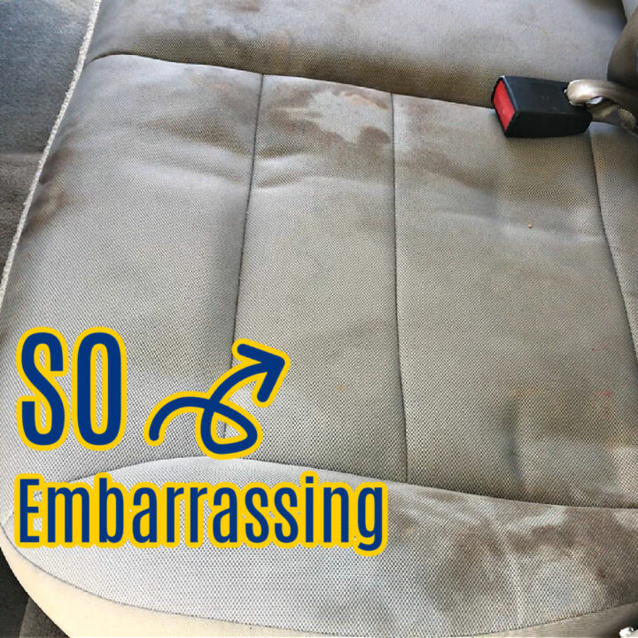 Image of cloth car seats with stain for a post about the best way to deep clean car seats and remove stains.