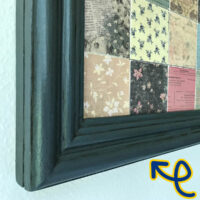 Image of a handmade DIY wood picture frame made with trim moulding.