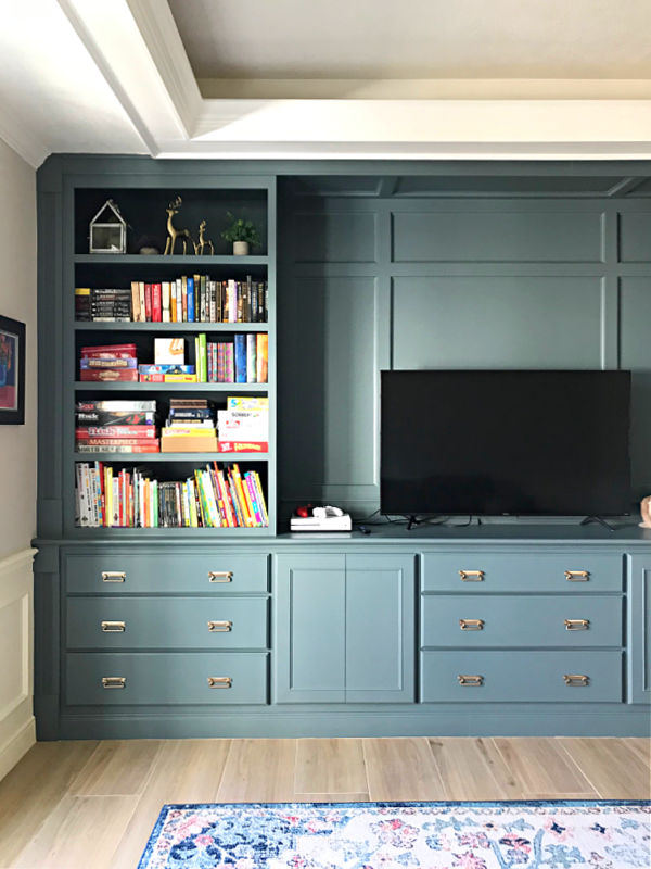 Grey Blue Built In Entertainment Center in a Family Room.