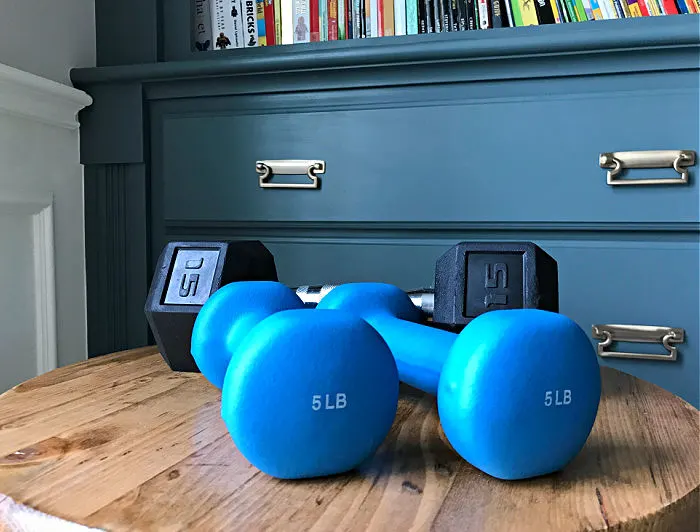 Picture of free weights. Exercise is an important part of feeling younger in your 40's.