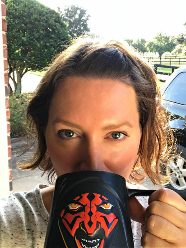 Photo of a woman drinking from a Darth Maul mug. Taken on my 43rd birthday.