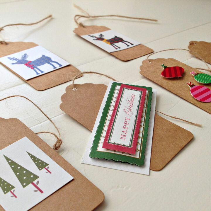 Image of handmade Christmas Ornaments made with Brown Paper Tags and old Christmas Cards. Simple Christmas Craft for little kids.