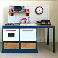 Image of a DIY Kids Kitchen made from wood, with printable PDF build plans - woodworking plans.