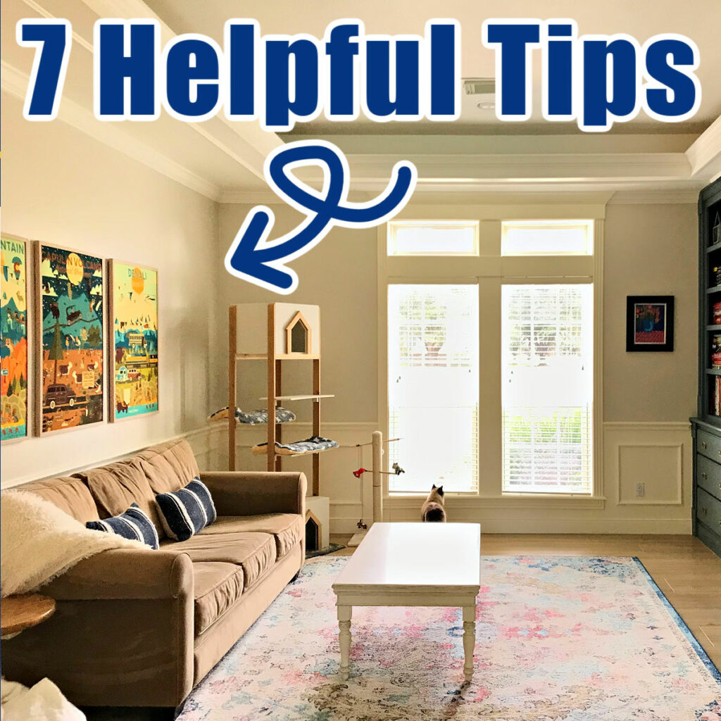 Image shows an example of decorating a large wall in a living room. Text says "7 Helpful Tips".