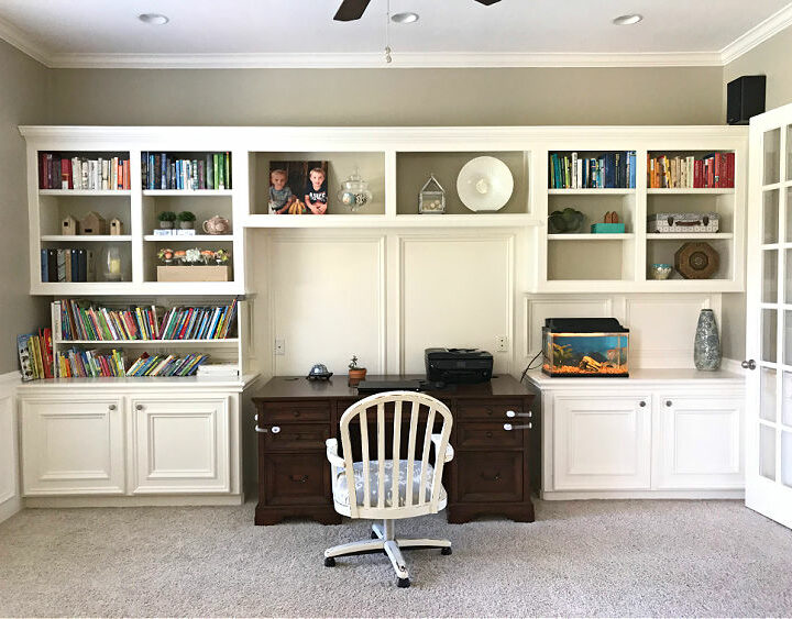 Before photo from a home office remodel. This home office has white built in cabinets for storage.