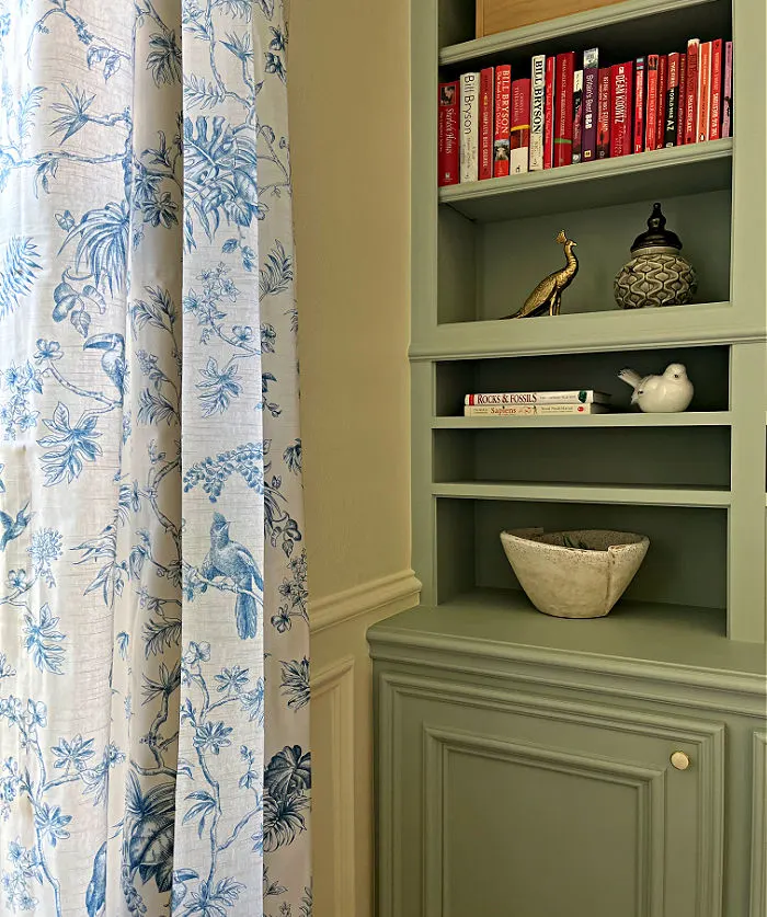 Low budget blue and white linen curtains in a home office remodel.