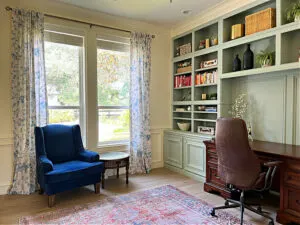 Wall to Wall cabinets and bookshelves in a home office with tons of storage and great home office decorating ideas.